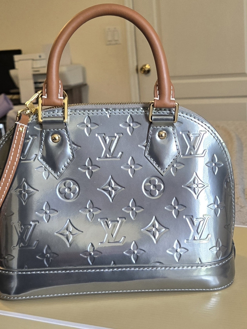 Louis Vuitton Metallic Silver Alma Handbag with Tan Handles